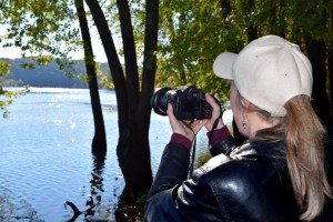 Karen Schulz, of May Township, takes a photo of the St. Croix River during a "Pictures of Stillwater" Facebook group outing at Arcola Mills, north of Stillwater, during the Pictures of Stillwater Fall Meet up and Photo walk on Saturday, Oct. 1, 2016. The group is dedicated to sharing photos and context telling the stories of the river town of Stillwater, Minn. (Pioneer Press: Mary Divine)